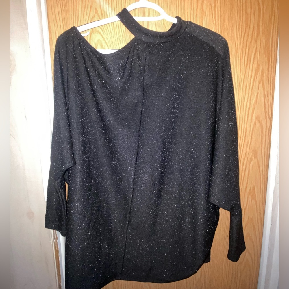 Women’s black sparkly top with asymmetrical cutout shoulders. Size S